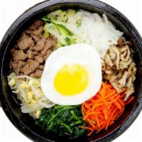 Dol-Sot-Bibimbap · Rice topped with vegetables and a choice of beef, chicken, or tofu with a fried egg.
*Sunny ...