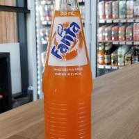 Fanta Orange · Made with cane sugar!