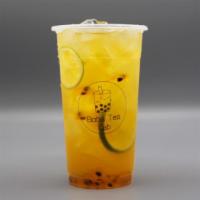 Passion Fruit Green Tea · passion fruit syrup, lime slices, jasmine green tea