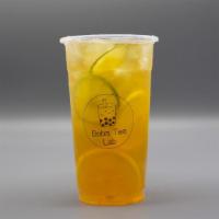 Kumquat Lemon Lime Green Tea · kumquat lemon lime syrup, lemon slices, lime slices