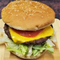 Cheesy Burger · A classic style cheeseburger made with our house seasoned beef patties with melted American ...