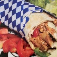Chicken Shawarma Wrap · chicken breast ,bill pepper ,onions ,red cabbage, pickles ,pickled turnips and garlic sauce ...