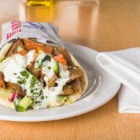 Lamb&Beef Gyro Wrap · Lamb & beef ,tomato , bill pepper, onions ,cucumber, lettuce and tzatziki sauce