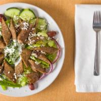 Gyro Salad · Gyro meat, lettuce, tomato, onion, pepper, feta cheese, tzatziki sauce