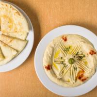 Hummus & 2 Pita · Creamy Hummus with Olive Oil, Variety of Olives and Smoked Paprika. Comes with 2 Pita's