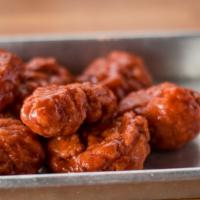 Boneless Wings · 8 boneless wings tossed with buffalo, hot, habanero BBQ or honey garlic. Served with a side ...