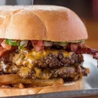 Jack Of All Trades Burger · Spicy. Ground chuck Angus beef, bacon, chipotle mayo, avocado, pico de gallo, french fries a...