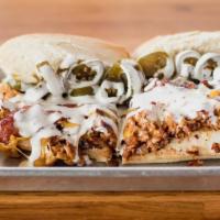 Pennywise Cheesesteak · Spicy. Fan-favorite. Chicken, grilled onions, jalapeños, bacon, ranch and Cheddar cheese.