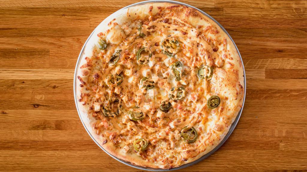 Texas Chainsaw Massacre · Spicy. White BBQ sauce, mozzarella, provolone cheese, Cheddar, chicken, tomatoes and jalapeños.