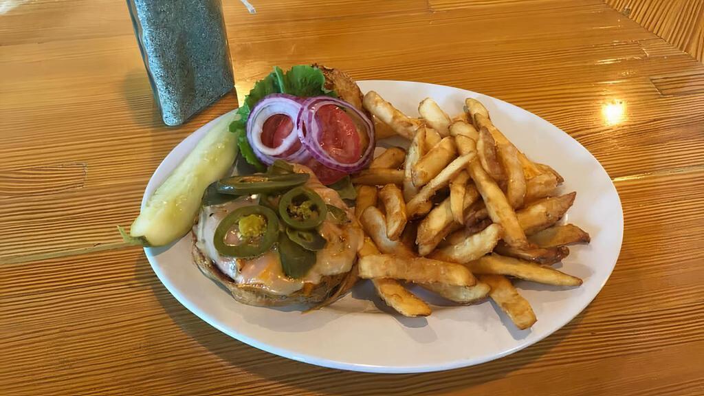 Pub Burger · Comes with lettuce, tomato, onion, pickles, and seasoned mayonnaise. Add Your Choice of Cheddar, Swiss, or Pepper Jack Cheese for an Additional Charge. Add Bacon for an Additional Charge.