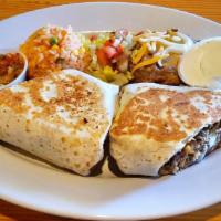 Pulled Pork Quesadilla With Pico De Gallo · Served with bbq sauce coleslaw and a pickle.