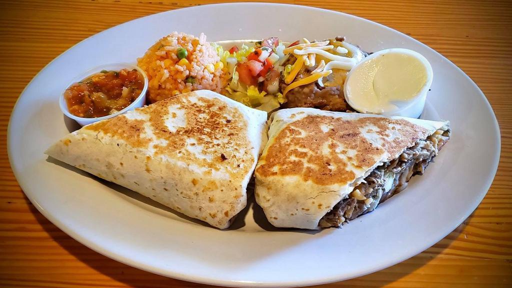 Pulled Pork Quesadilla With Pico De Gallo · Served with bbq sauce coleslaw and a pickle.