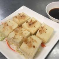 Agedashi Tofu · Fried tofu with dipping sauce.