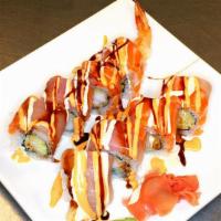 Samurai Roll · Tempura shrimp topped with yellowtail and salmon served with house sauce and funky sauce. Raw.