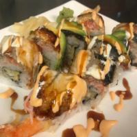 Emperor Roll · Tempura shrimp roll, topped with crab salad, unagi, and avocado.