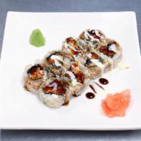 Black Magic Sushi Roll · Smoked, salmon, unagi, cucumber, and sesame seed. Raw.