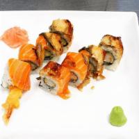 Sugar House Roll · Tempura shrimp topped with eel and fresh salmon and with house special sauce. Raw.