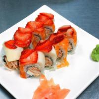Strawberry Field Roll · Snow crab with cream cheese topped with salmon, white tuna, and strawberry served with speci...