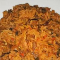 Palm Oil Rice Concotion With Beans · 