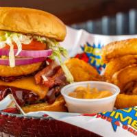 Western Burger* · Barbecue sauce, cheddar cheese, Applewood smoked bacon and a fried onion ring. Served with l...