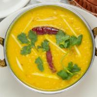 Dal Tadka · Veggie. Yellow lentil cooked with onion, tomato and flavored with butter and spices.