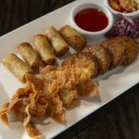 Appetizer Plate · An abundant platter of fried fishcakes, fried wontons and miniature fried spring rolls. Serv...