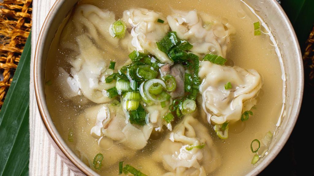 Wonton Soup · Tasty shrimp and pork wontons are featured in a light broth topped with chopped scallions.