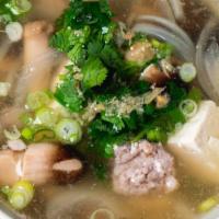 Tofu Soup · A light, flavorful soup made with a clear broth, tofu, seasoned ground pork, mushrooms, whit...