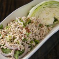Larb · Distinctively Thai, this dish blends red onions, green onions, cilantro, chili, lime juice a...