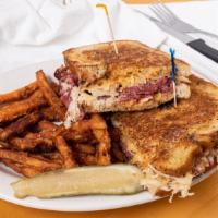 Famous Reuben · House cured corned beef, our mustard seed and caraway rye bread, pub made sauerkraut, our 10...