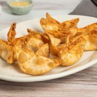 Crab Rangoon · Six pieces. Cream cheese and imitation crab meat wrapped in a crispy crust.