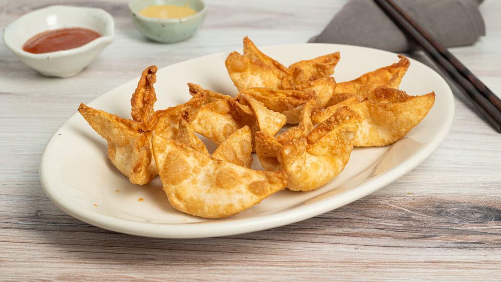 Crab Rangoon · Six pieces. Cream cheese and imitation crab meat wrapped in a crispy crust.