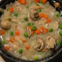 Shrimp Sizzling Rice Soup · For two. Golden rice cake is set sizzling into a soup of shrimp, mushrooms, and other vegeta...