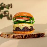 Hall Of Jalapeno Vegan Burger · Seasoned plant-based patty topped with melted vegan cheese, jalapenos, lettuce, tomato, onio...