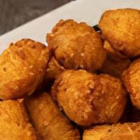 Cheese Potato Tots · Deep Fried Potato Tots with Nacho cheese