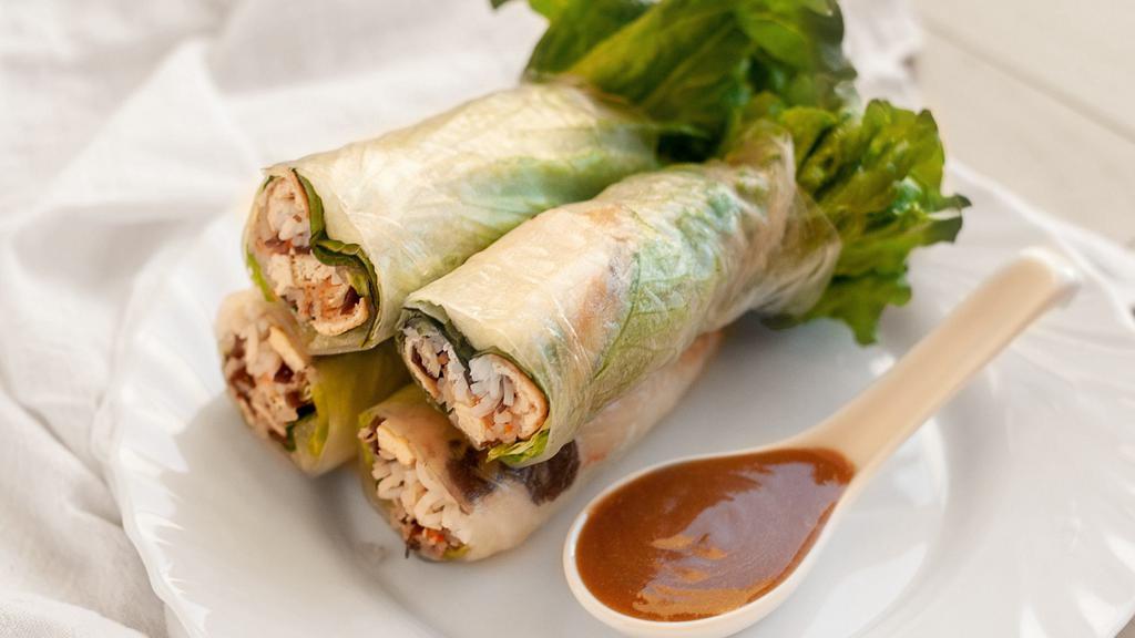 Blossom Fresh Rolls · Assorted mushrooms, tofu, carrots, jicama, lettuce, basil, and wrapped in rice paper. Served with peanut sauce.