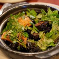 Caramelized Fish In Clay Pot · Beancurd skins wrapped in seaweed, black pepper, coriander, and coconut juice.