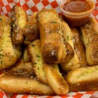 Breadsticks (14) · Topped with Garlic Butter, Parmesan and Parsley Flakes.
Served with Marinara