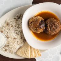 Koftah · Turkish meatball. Slowly cooked turkey meatball with spices and exquisite dressing on top, s...