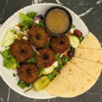 Falafel Greek Salad · Romaine lettuce, tomatoes, cucumbers, red onions, pitted black kalamata olives, and homemade...