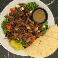 Beef Shawarma Greek Salad · Romaine lettuce, tomatoes, cucumbers, red onions, pitted black kalamata olives, and homemade...