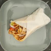 Chicken Shawarma Pita · Chicken breast marinated in our special mediterranean seasonings, flame-broiled on a vertica...