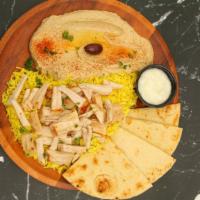 Chicken Shawarma Plate · Chicken breast marinated in our special Mediterranean seasonings, flame-broiled on a vertica...