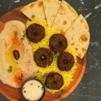 Falafel Plate · A vegetarian, dish blend of garbanzo beans, vegetables, and seasonings, with choice of 2 sid...