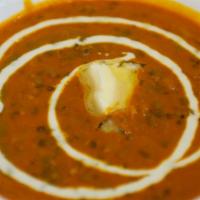 Dal Makhani · Black gram, kidney beans cooked on slow fire with a blend of mild spice.