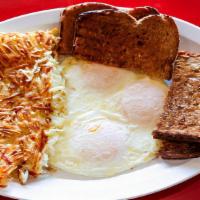 Basic Breakfast · 2 Eggs served with hash browns and choice of toast