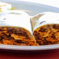 Chorizo Burrito · Pork and beef chorizo, diced green chilies, and red onions, scrambled with 4 eggs and pepper...