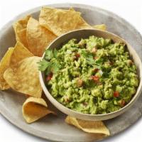 Guac + Chips · Crispy tortilla chips served with creamy guacamole!