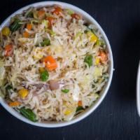 Veg Schezwan Fried Rice · Aromatic rice stir fried with fine chopped cabbage, carrots, and bell peppers and spicy Sche...