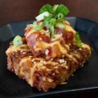 Crispy Rice · 2 pieces of crispy rice topped with your choice of
salmon or tuna drizzled in spicy mayo and...